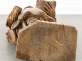 a piece of wood that has been cut in half