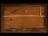 an old picture of a wooden box with a rope on it