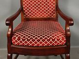 an image of a chair with a red and white patterned upholstered seat