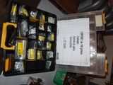 a box full of screws and nuts on a table