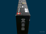 a black box that is sitting on a blue surface