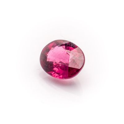a pink tourmaline gems on a white background