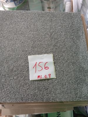 une photo d'un morceau de tissu sur lequel est accrochée une étiquette de prix