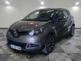 la photo d'une voiture grise garée dans un garage