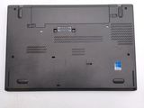 a close up of a laptop on a white surface