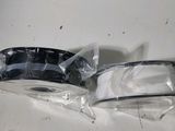 two pieces of plastic on top of a table