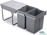 a sink with two bins on it and a table underneath it