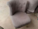 two chairs that are sitting on the floor in the room