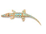 an image of a gold and turquoise lizard broochle