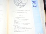 an open book with a picture of a heart on it