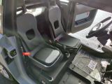 a picture of the inside of a vehicle with the seats down