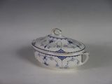 a blue and white bowl with a lid on a white table
