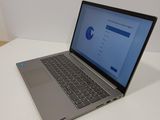 a laptop that is sitting on a white table