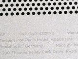 a close up of a metal plate with holes on it