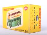 a toy bus that is in a box on the table