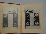 an open book with a picture of a picture inside of it