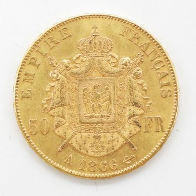 l'image d'une pièce d'or sur laquelle figurent des armoiries