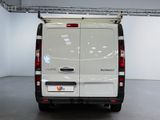a white van that is parked inside of a building