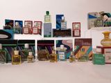 many different types of perfumes on a shelf