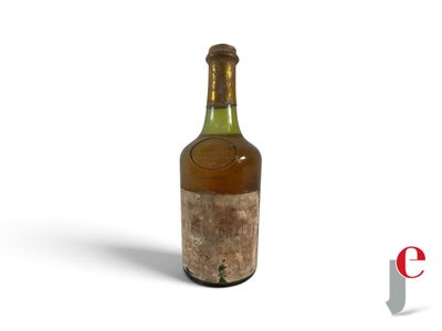 a bottle of wine that is sitting on a table