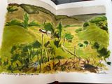 a picture of a book with a picture of a landscape in it