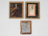 three framed pictures of a man and a woman on a white wall