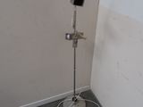a phone on a stand in the corner of a room
