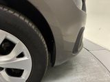 a close up view of a car ' s tire on the floor