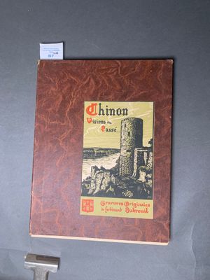 une photo d'un livre sur lequel figure l'image d'un château