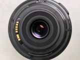 an overhead view of a camera lens on a white surface