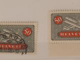 deux timbres sur lesquels figurent une batte de baseball et une balle de baseball