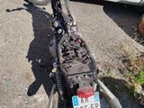 a motorcycle that is parked on the side of the road