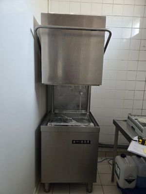 an image of a commercial kitchen with a stainless steel sink