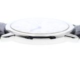 an image of a close up of a watch on a white surface