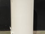 an image of a white water heater sitting on top of a floor
