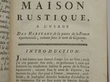 an open book with a black and white image of the title of a poem