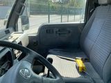 a view of the inside of a vehicle from the driver ' s seat