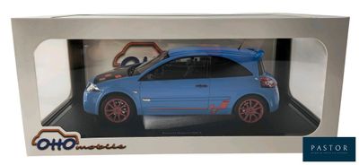 blue toy car in a white box with red rims