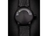 a close up of a watch on a black leather strap