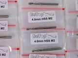 many different sizes of sewing needles in a plastic bag