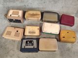 a lot of different types of electronic devices on the floor