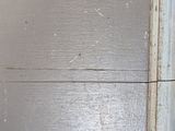 an image of a close up of a crack in a door