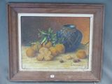 un tableau représentant un vase bleu avec des oranges posés sur une table