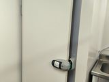 a bathroom with a toilet and a sink in it