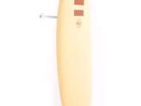 a surfboard that is leaning up against a wall