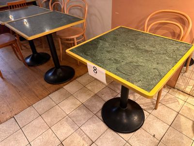a table with a number on it in a restaurant
