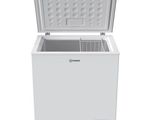 a white chest freezer sitting on top of a white surface