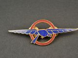 a close up of a badge with a bird on it