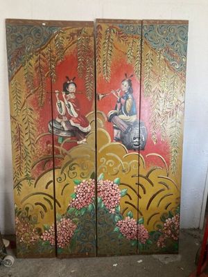 two panels of a painting of a woman and a man sitting on a bench