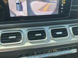 a close up of a car ' s dashboard with a camera mounted on the dash